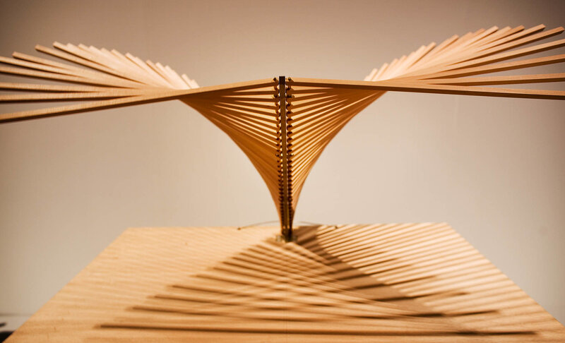 Wooden sculpture with radiating slats