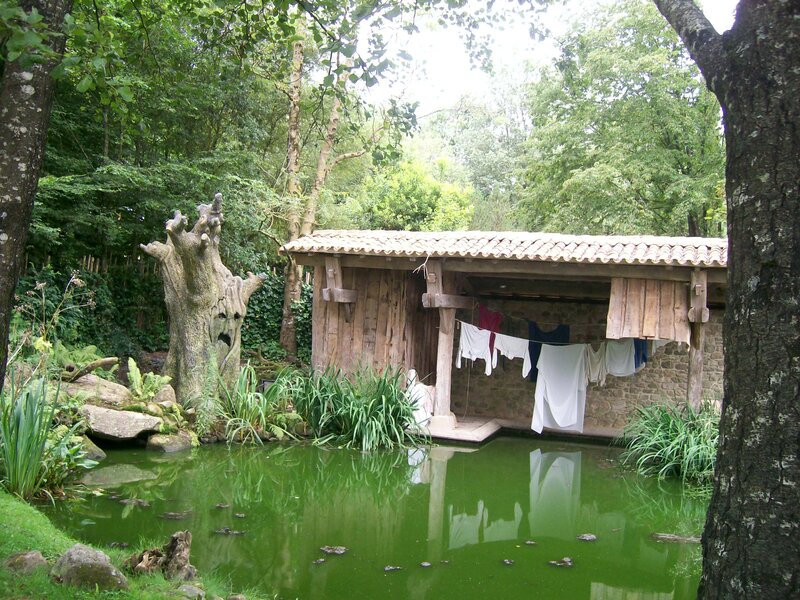 Wooden Shed by Pond