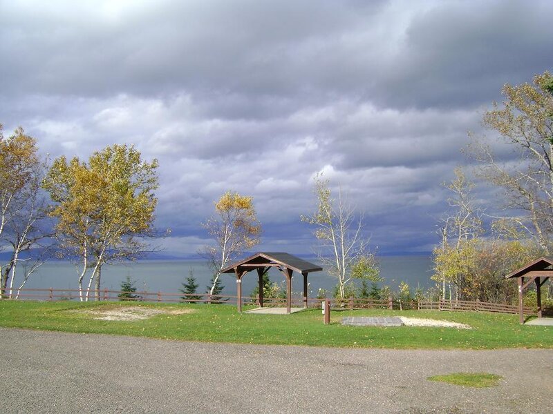 Wooden Shelters by Lake