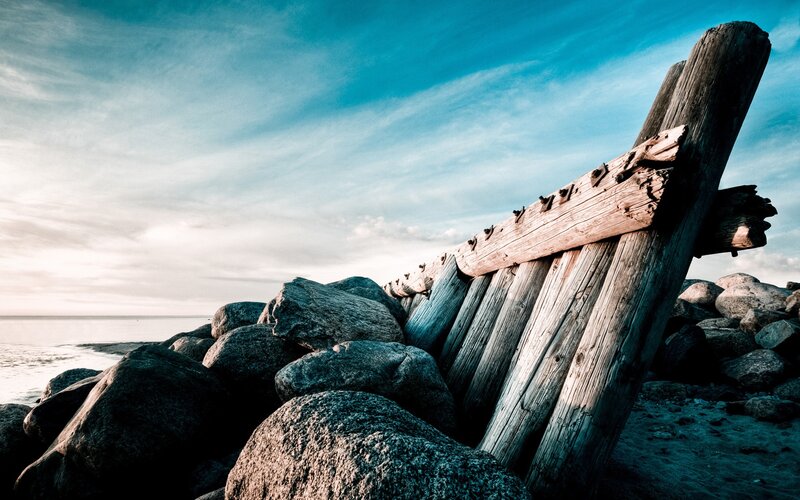 Wooden Shipwreck on Rocks — Blue