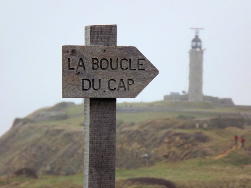Wooden sign pointing to La Boucle du Cap