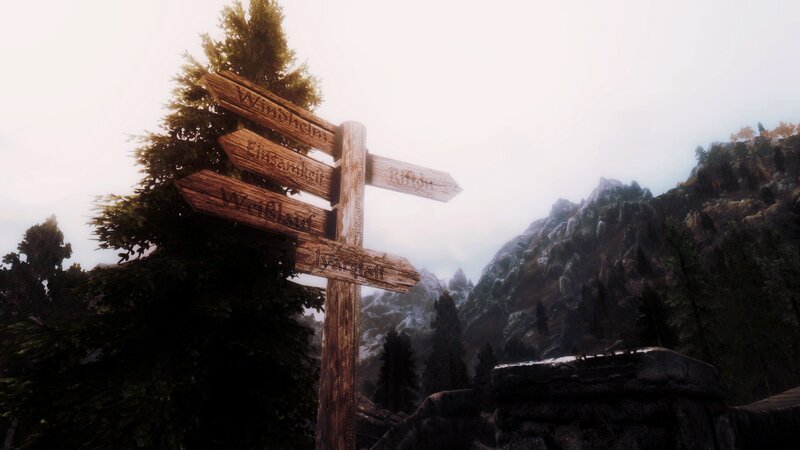 Wooden Signpost in Mountains