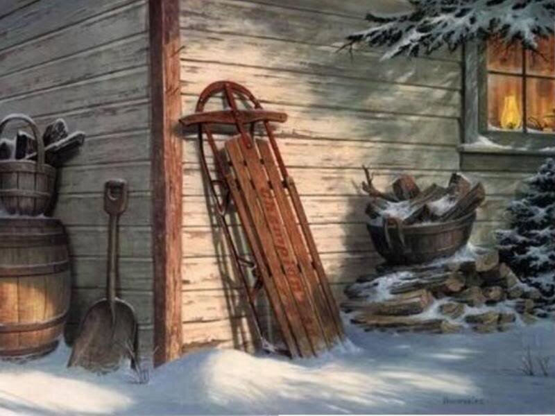 Wooden Sled Against Cabin