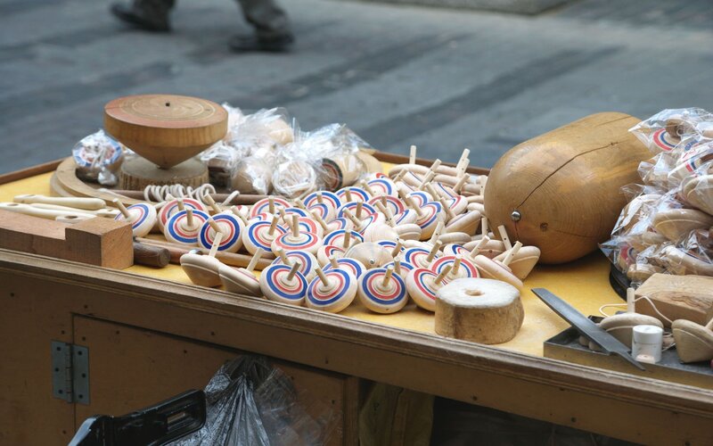 Wooden spinning tops for sale