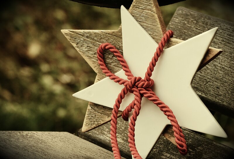 wooden star with red rope
