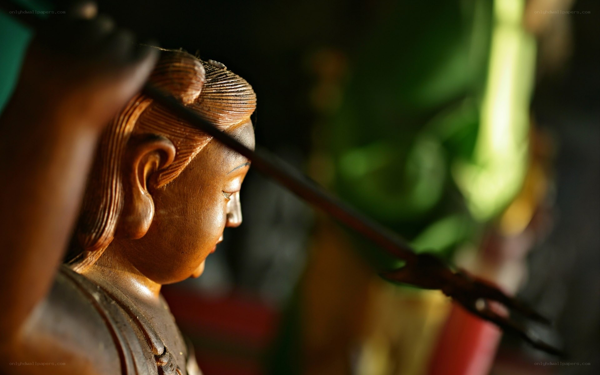 wooden statue in sunlight