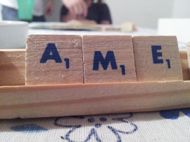 wooden tiles spelling ame