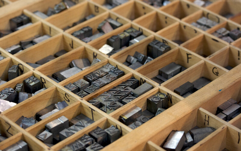 Wooden type case with metal letters