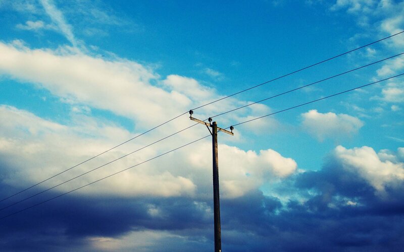 Wooden Utility Pole — Blue, Dramatic, Afternoon