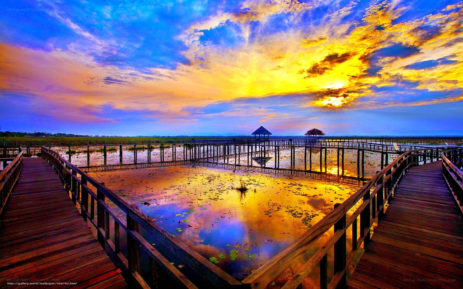 Wooden walkway at sunset