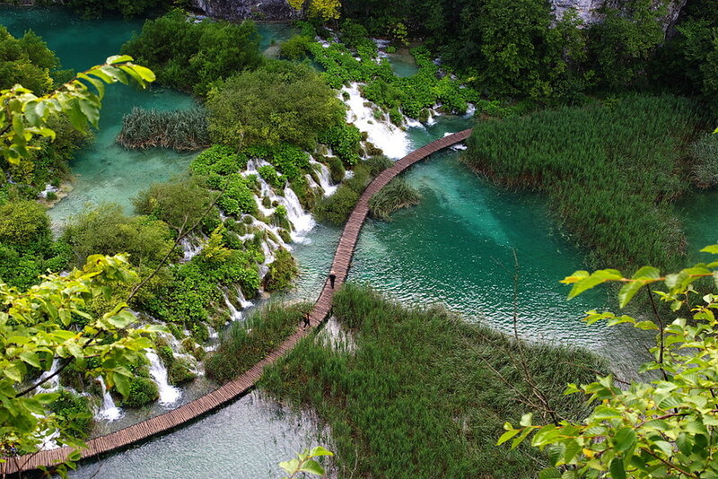 Wooden Walkway Through Waterfalls