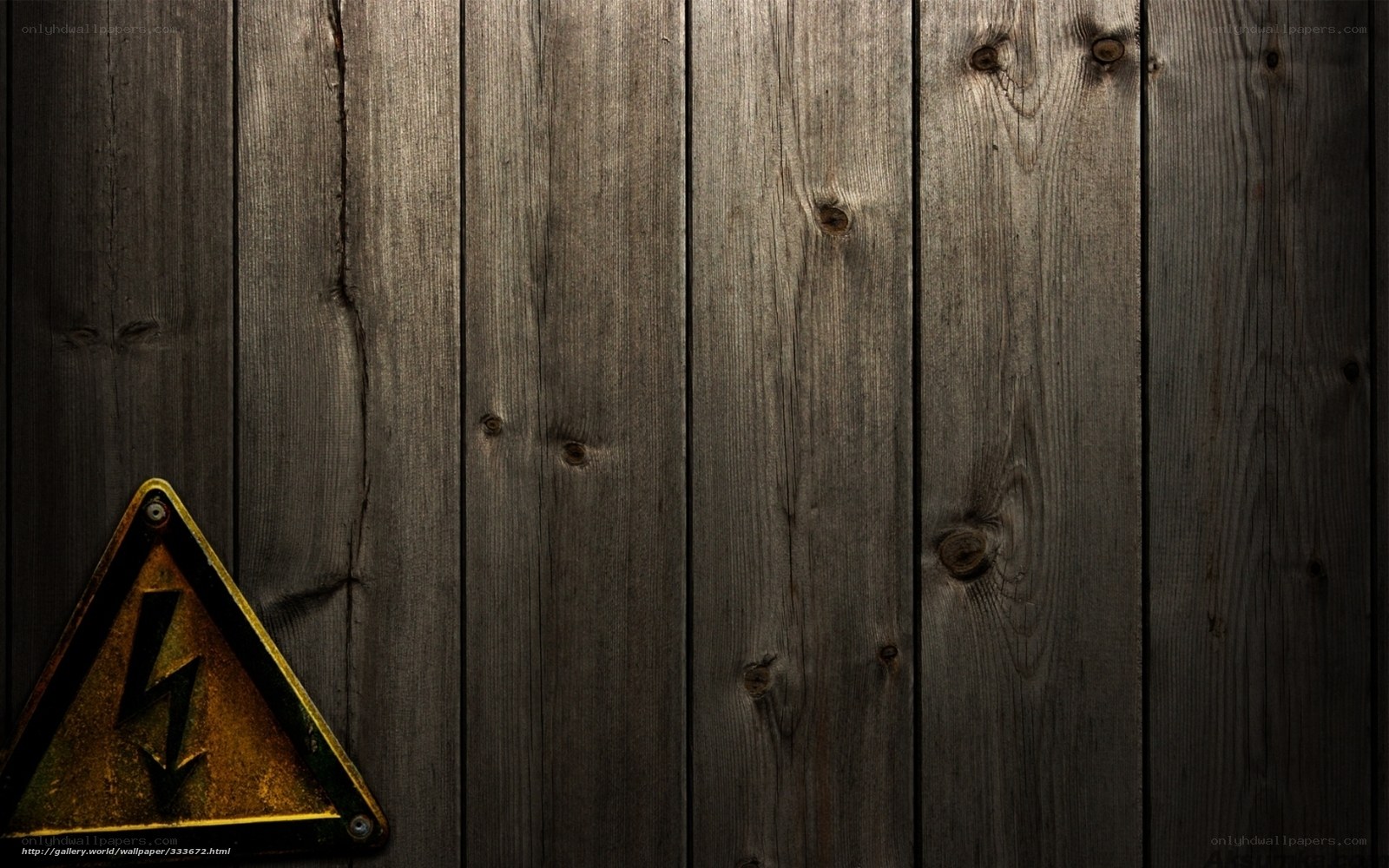 wooden wall with warning sign