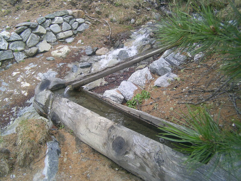 wooden water channel in mountain