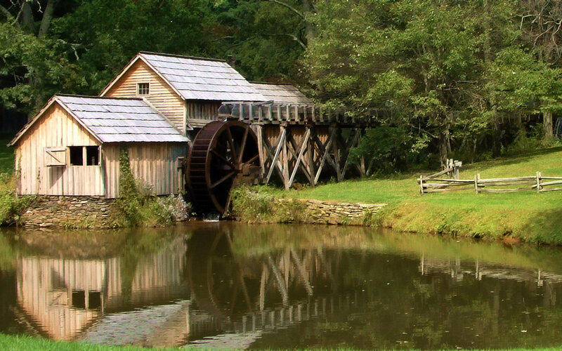 Wooden Watermill by River