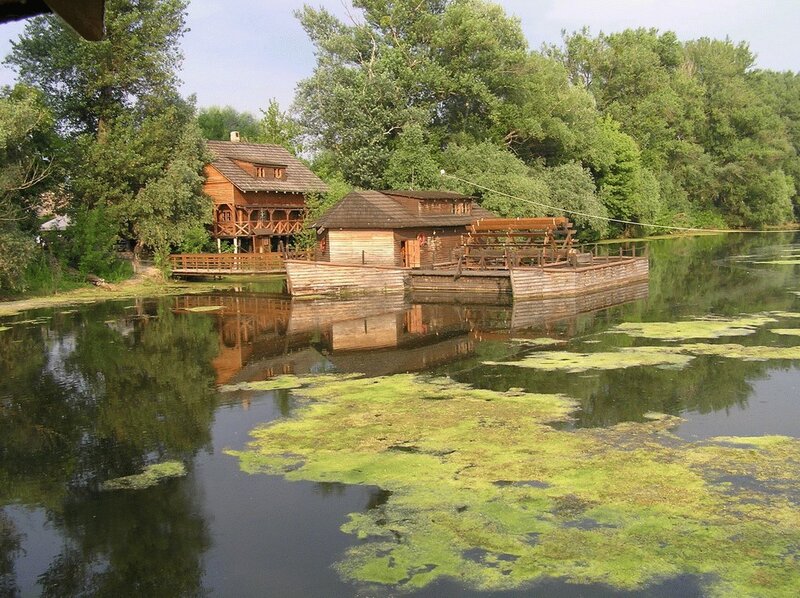Wooden Watermill on River