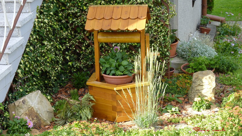 Wooden Well in Garden