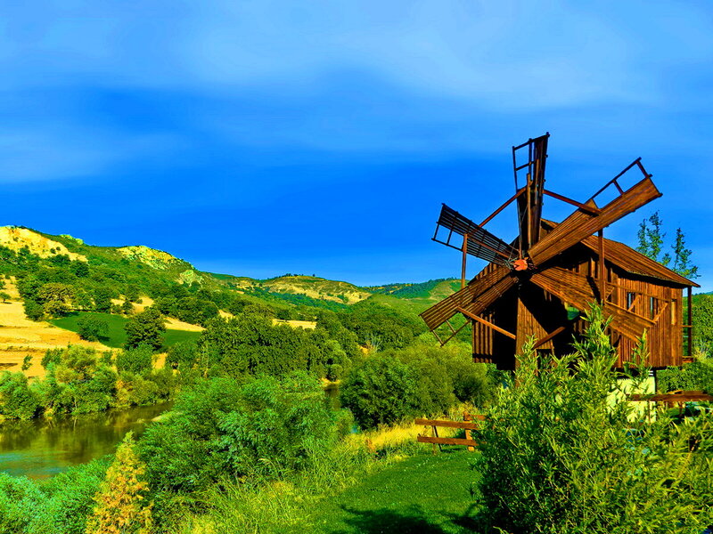 Wooden Windmill by River
