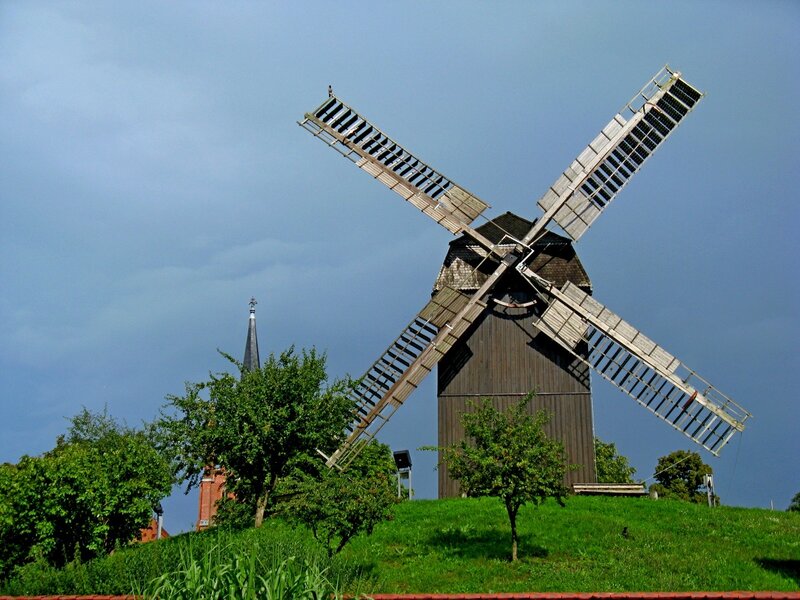 Wooden Windmill on Hill
