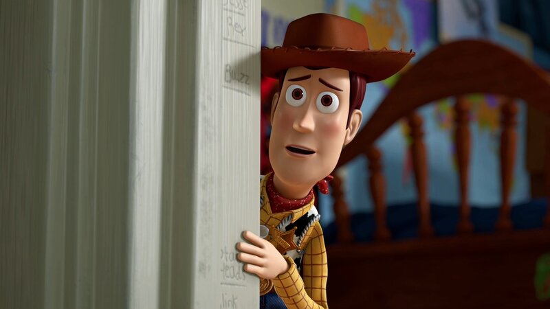 Woody peeking from behind a door