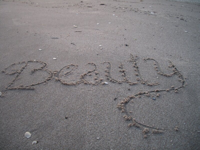 Word Beauty Written in Sand