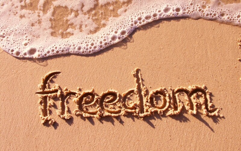 Word Freedom in Sand — Brown, Serene, Afternoon