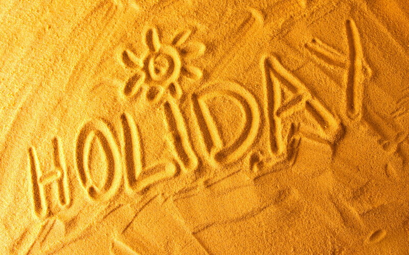 Word Holiday in Sand — Yellow