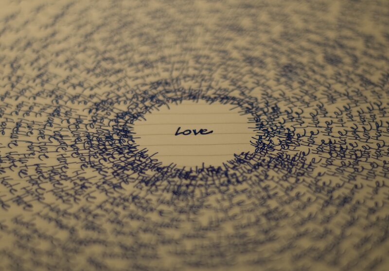 Word Love Written on Paper — Blue
