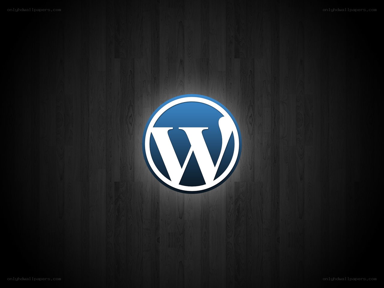 WordPress logo on wood