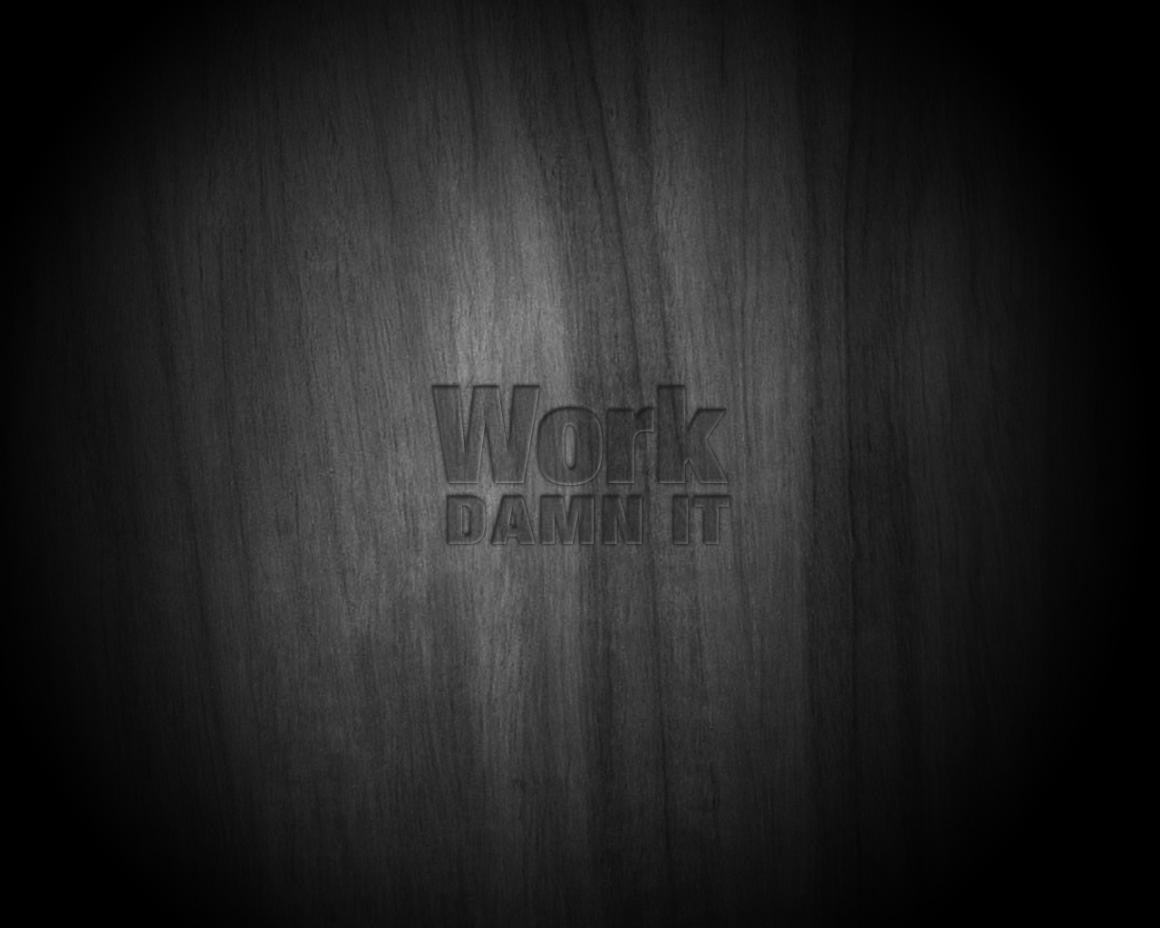Work Damn It text on wood