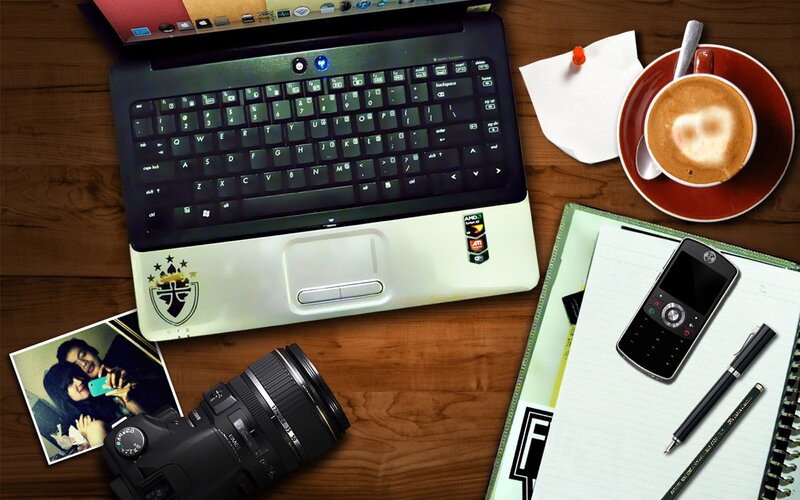 Work desk with laptop and coffee