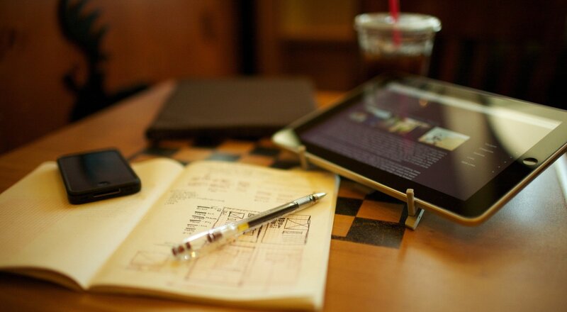 Work desk with tablet and notebook