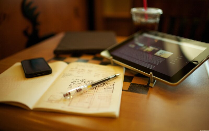 Work desk with tablet and notebook