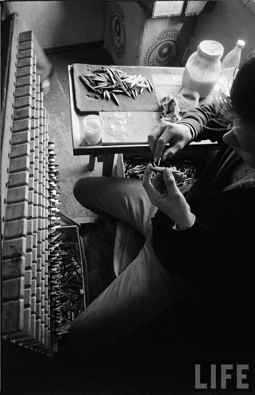 worker assembling small parts