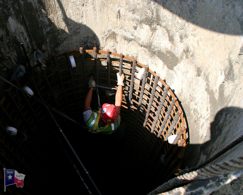 Worker in a concrete shaft