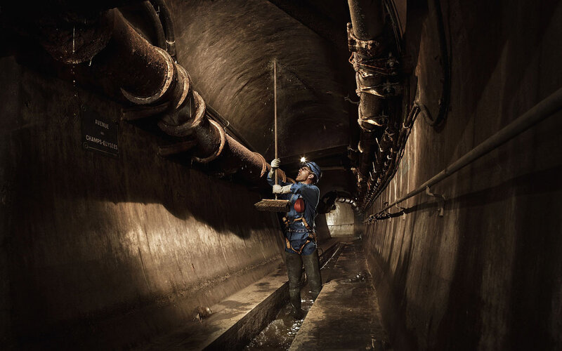 Worker in underground tunnel
