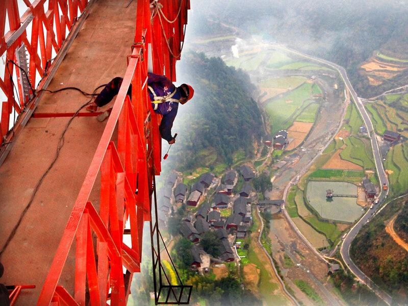 Worker on a Bridge
