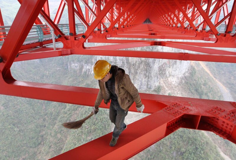 Worker on Bridge Structure