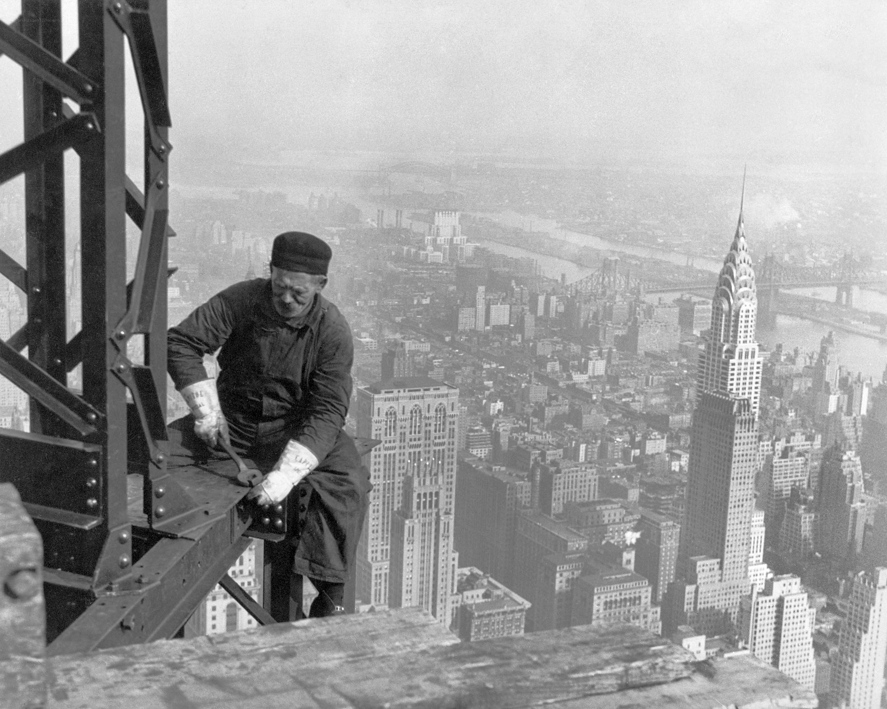 Worker on steel beam