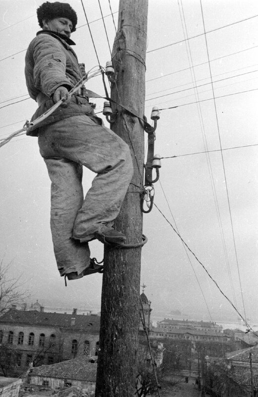 Worker on utility pole