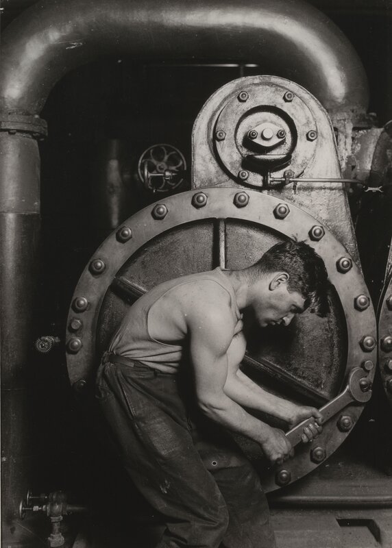 Worker operating industrial machinery