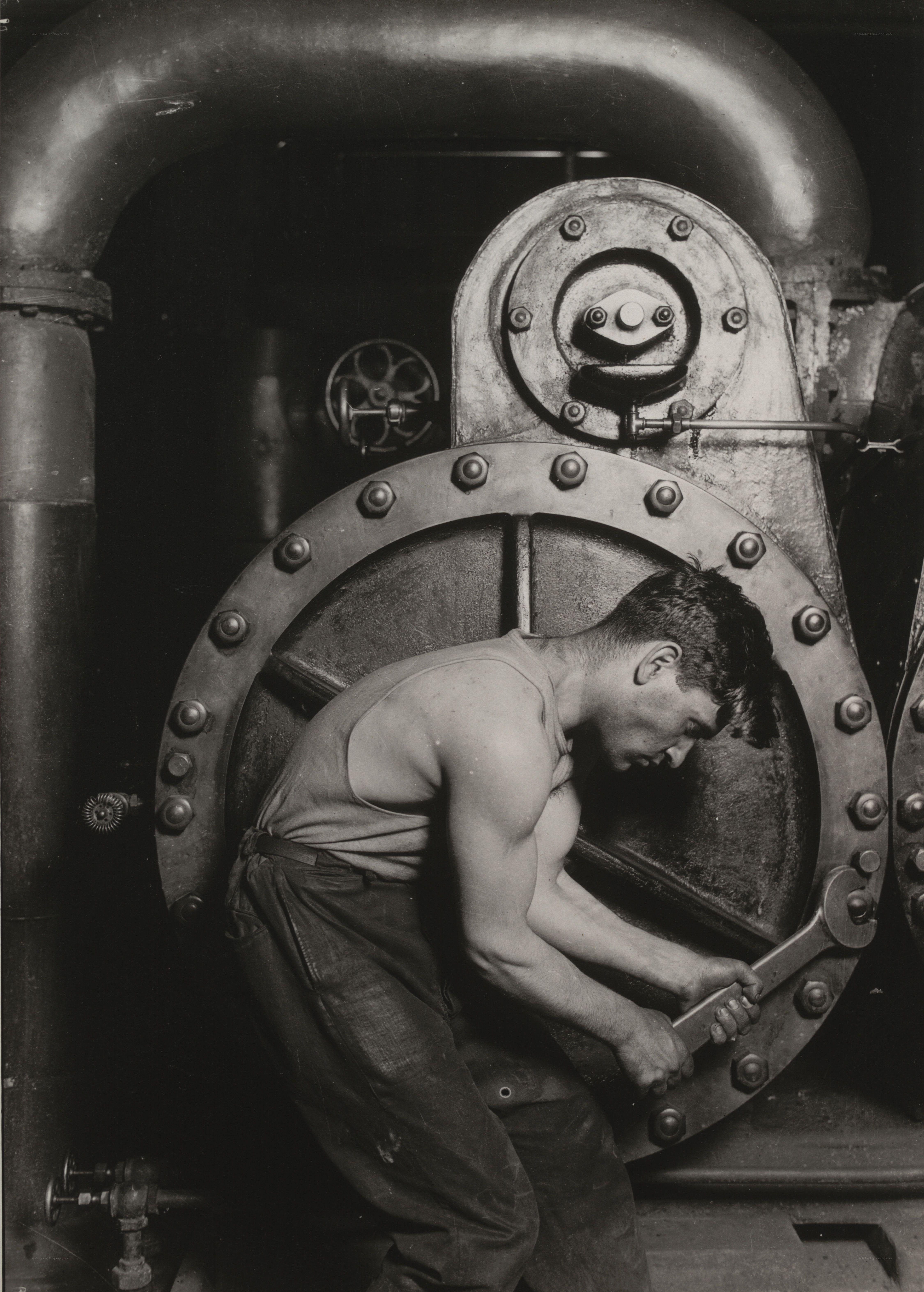 Worker operating industrial machinery
