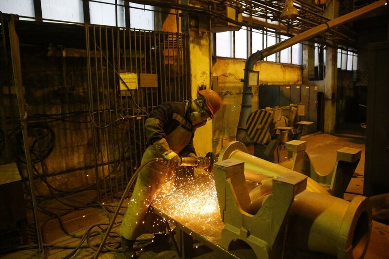 Worker Welding Metal