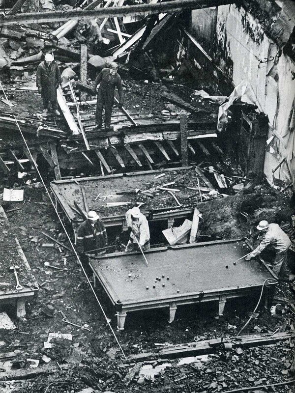 Workers at a damaged site
