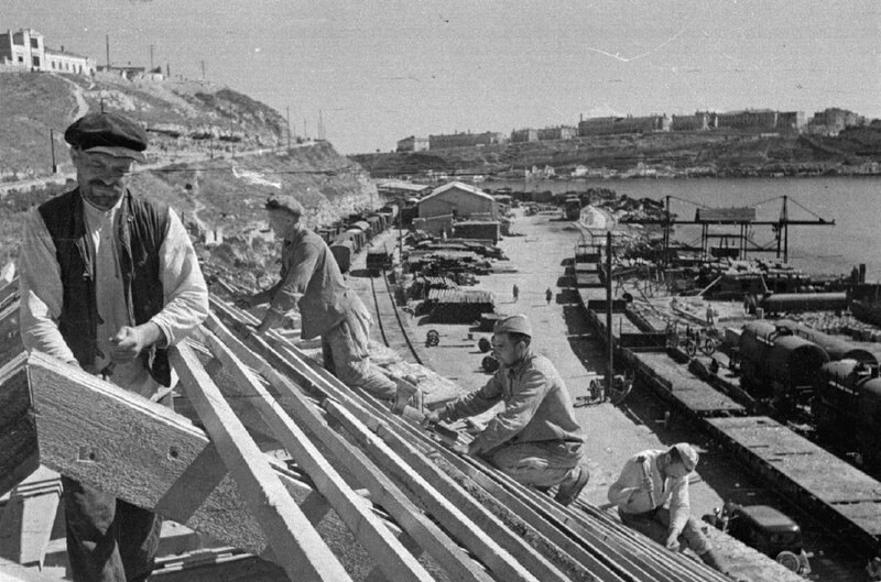 Workers at a port construction site