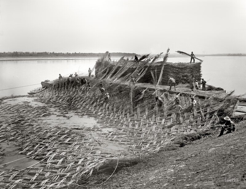 Workers building a raft