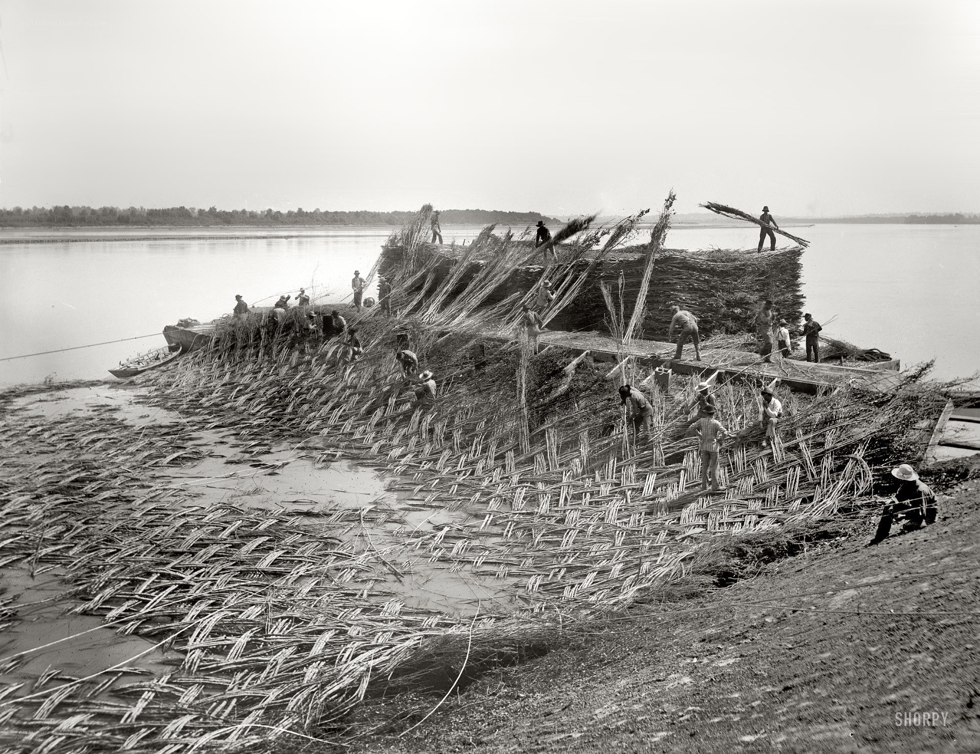 Workers building a raft