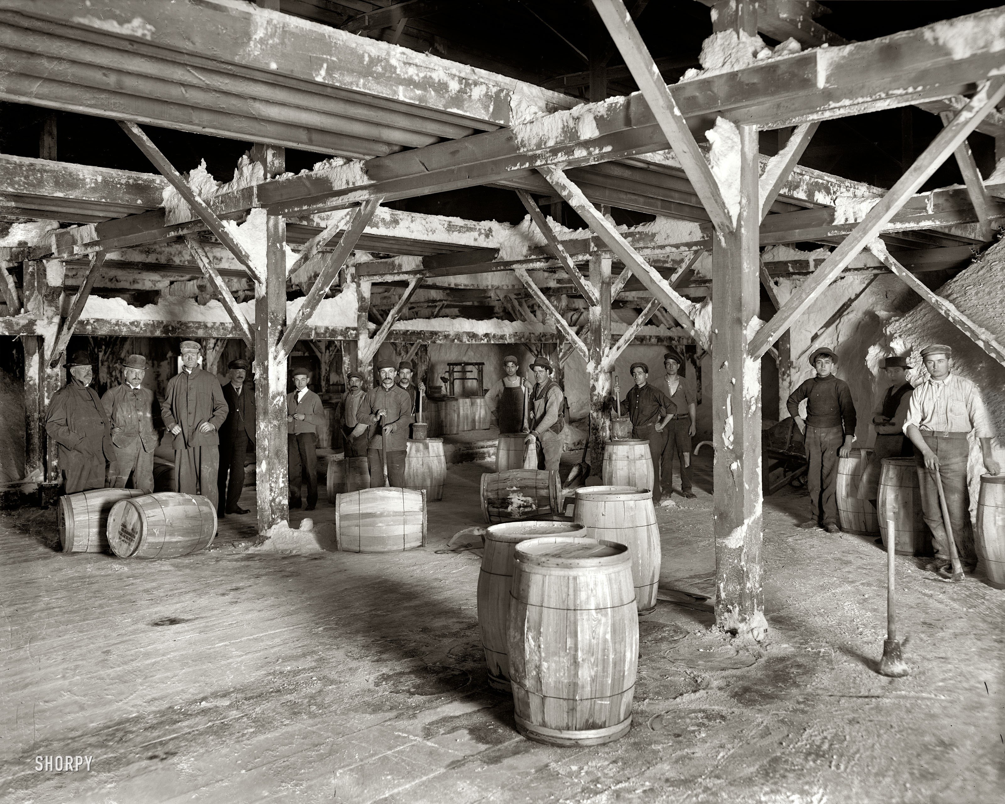 Workers in a barrel storage room