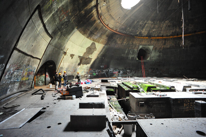 Workers in a concrete tunnel