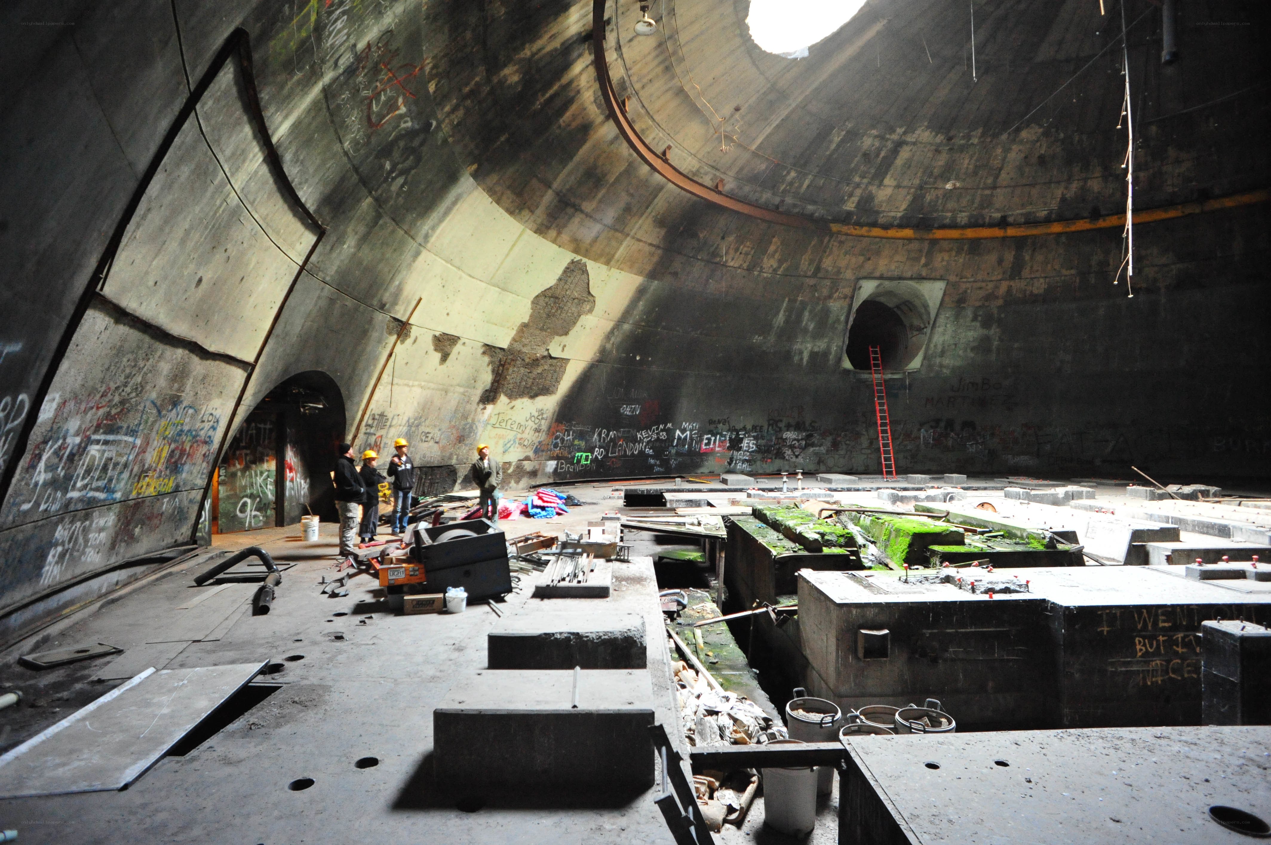 Workers in a concrete tunnel