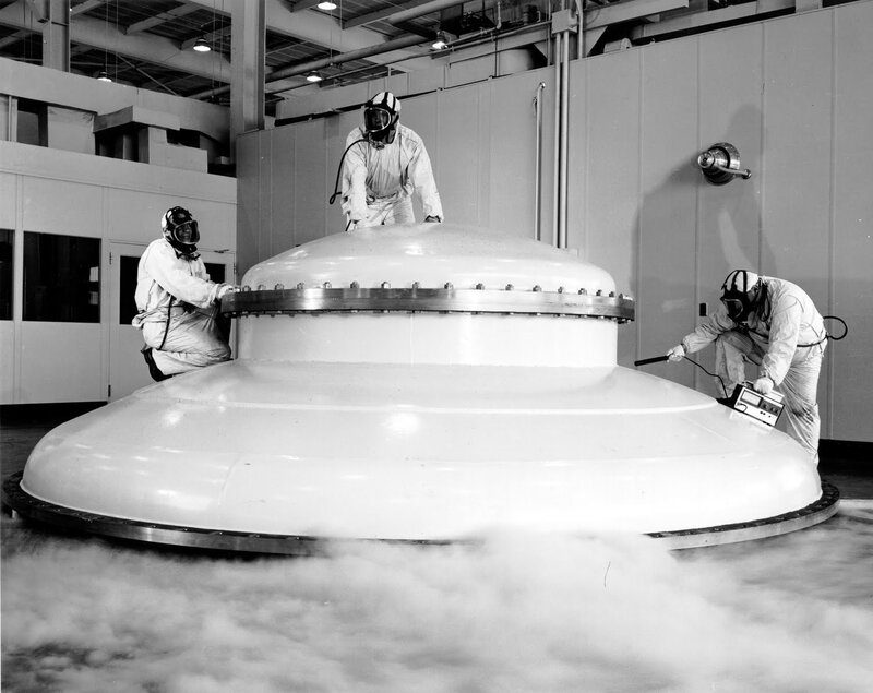 Workers in Protective Suits